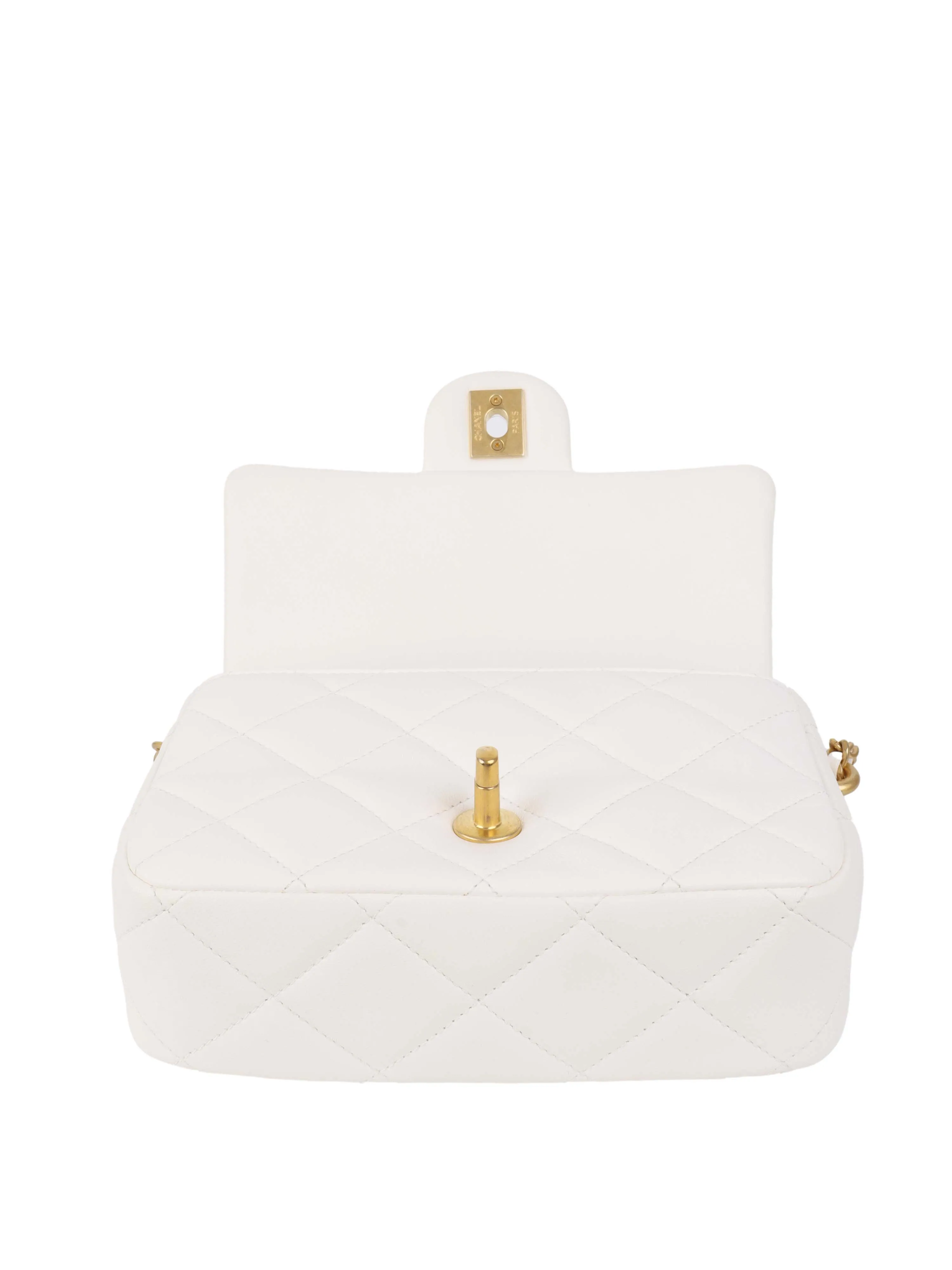 Chanel White and Pearl Chain Flap Bag.