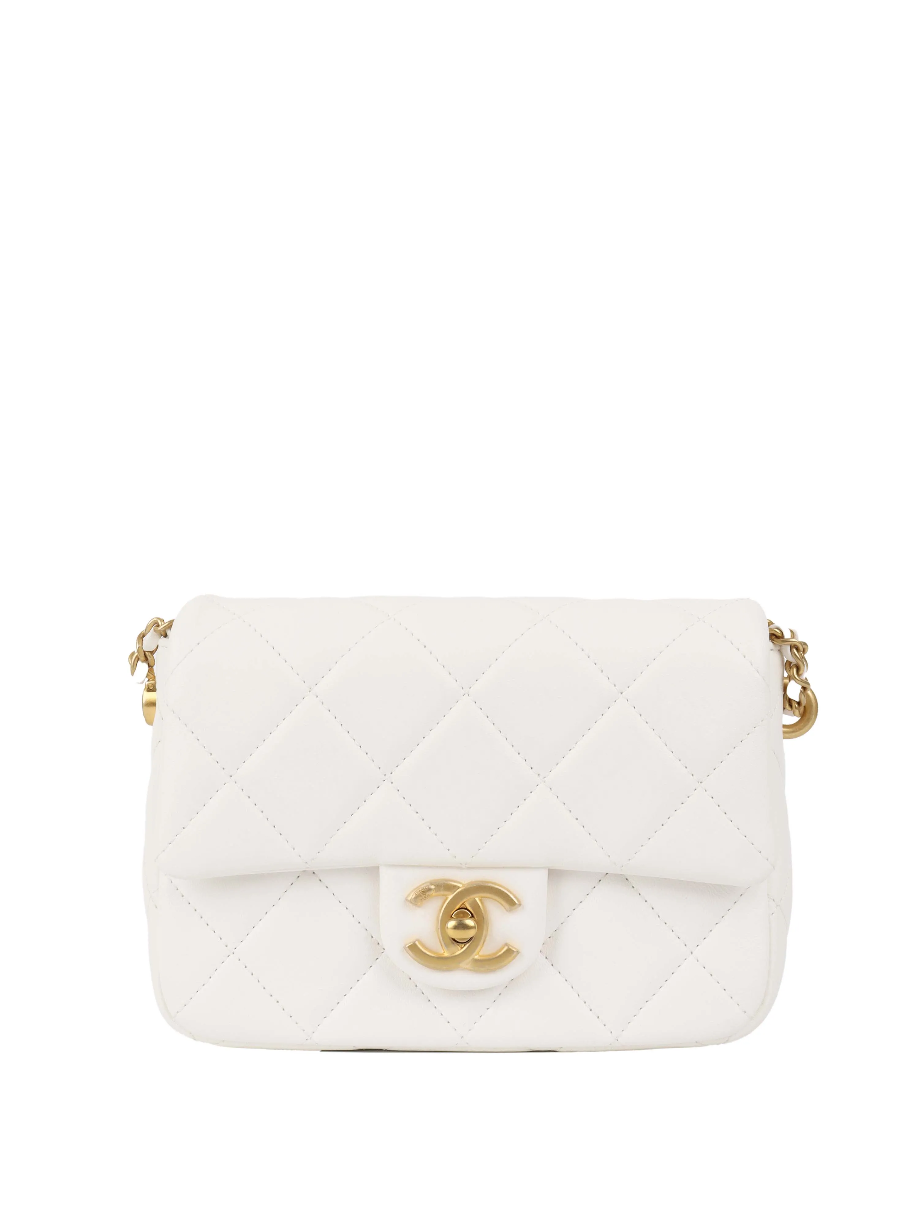 Chanel White and Pearl Chain Flap Bag.