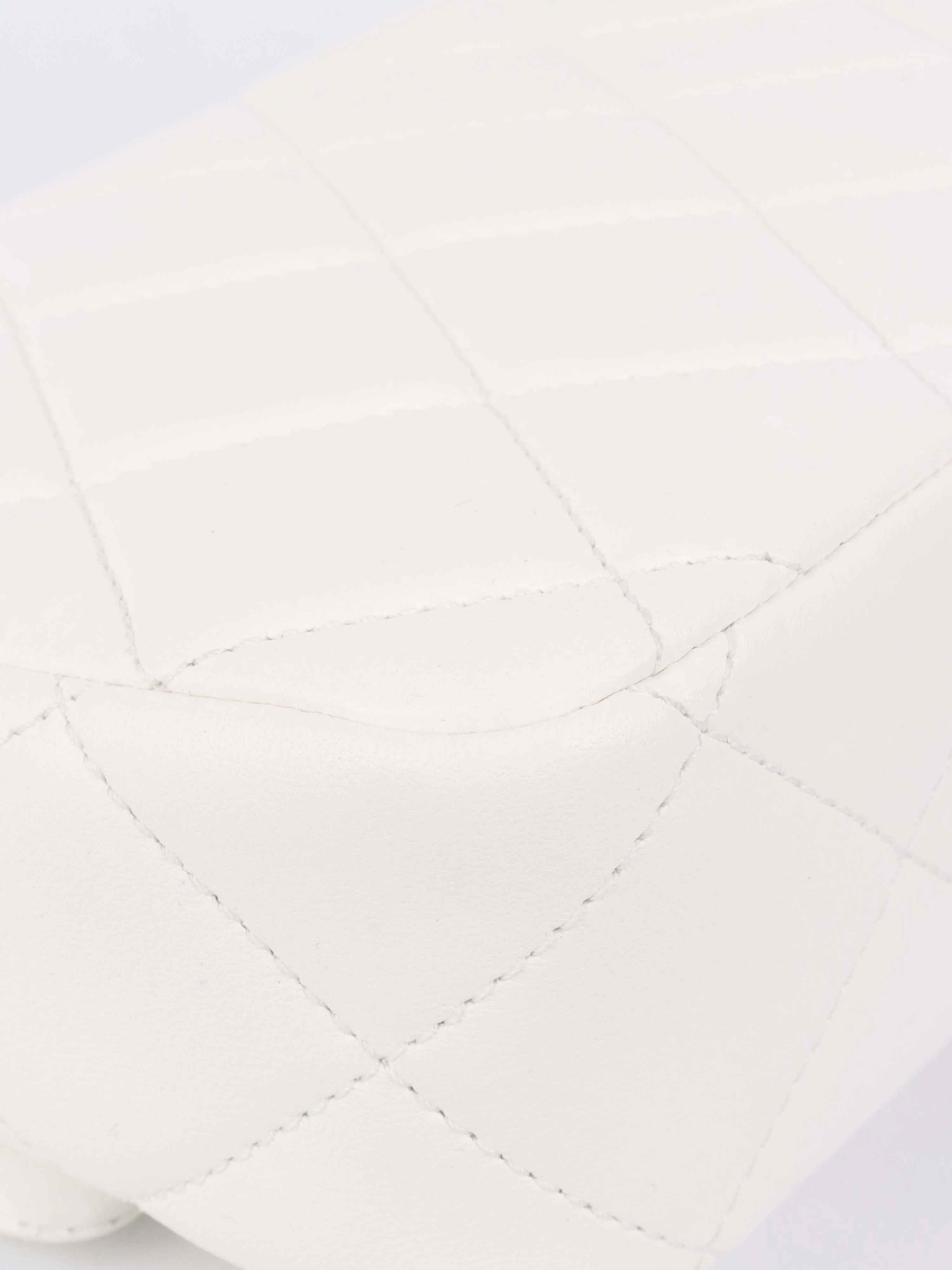Chanel White and Pearl Chain Flap Bag.