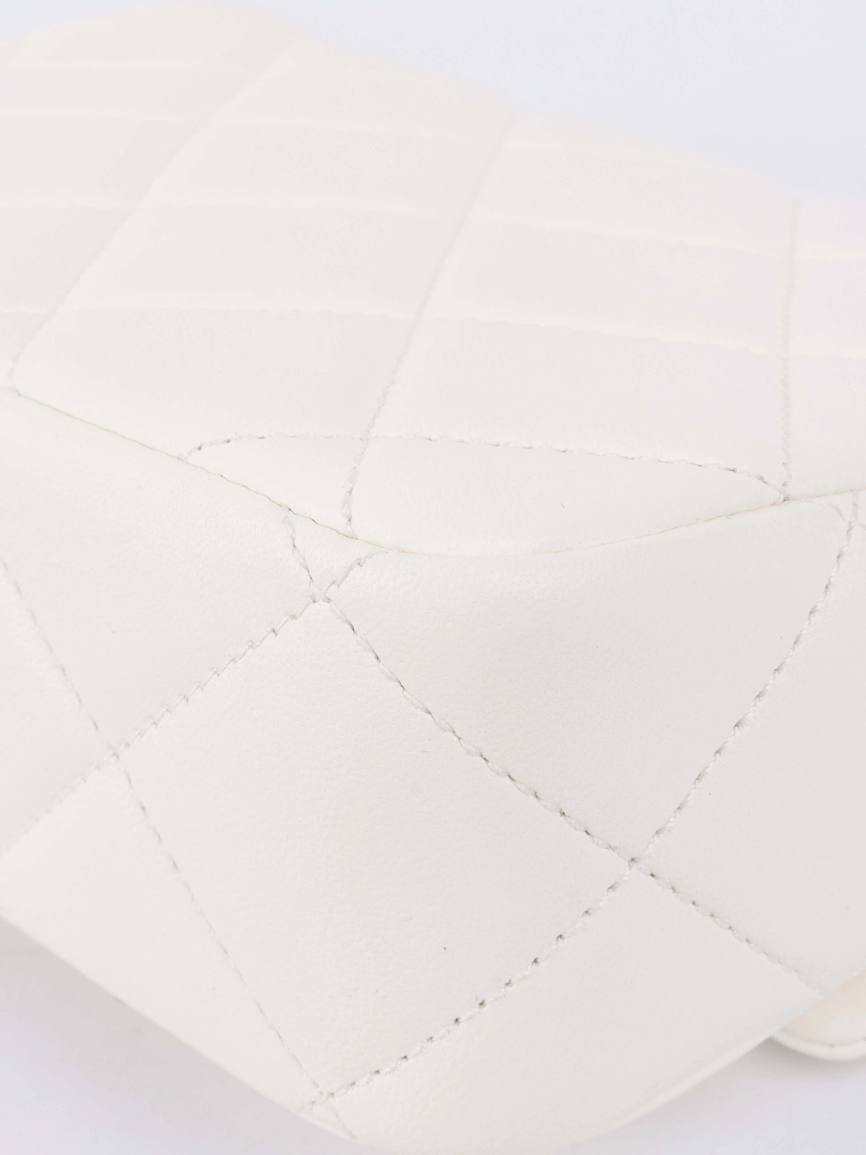 Chanel White and Pearl Chain Flap Bag.